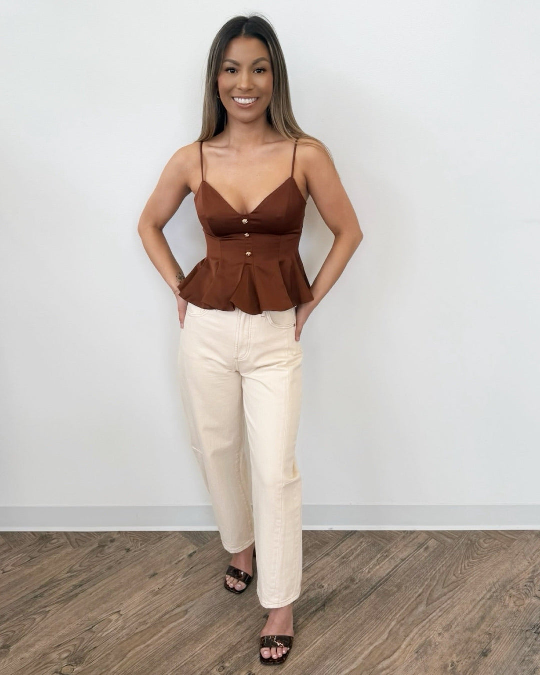 Irabella Sleeveless Top with Peplum HemlineTop