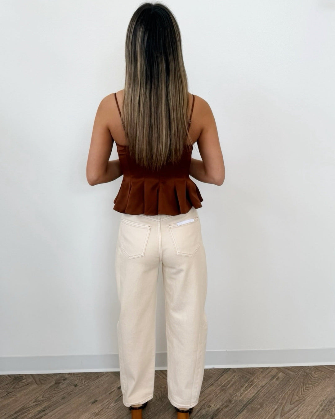 Irabella Sleeveless Top with Peplum HemlineTop