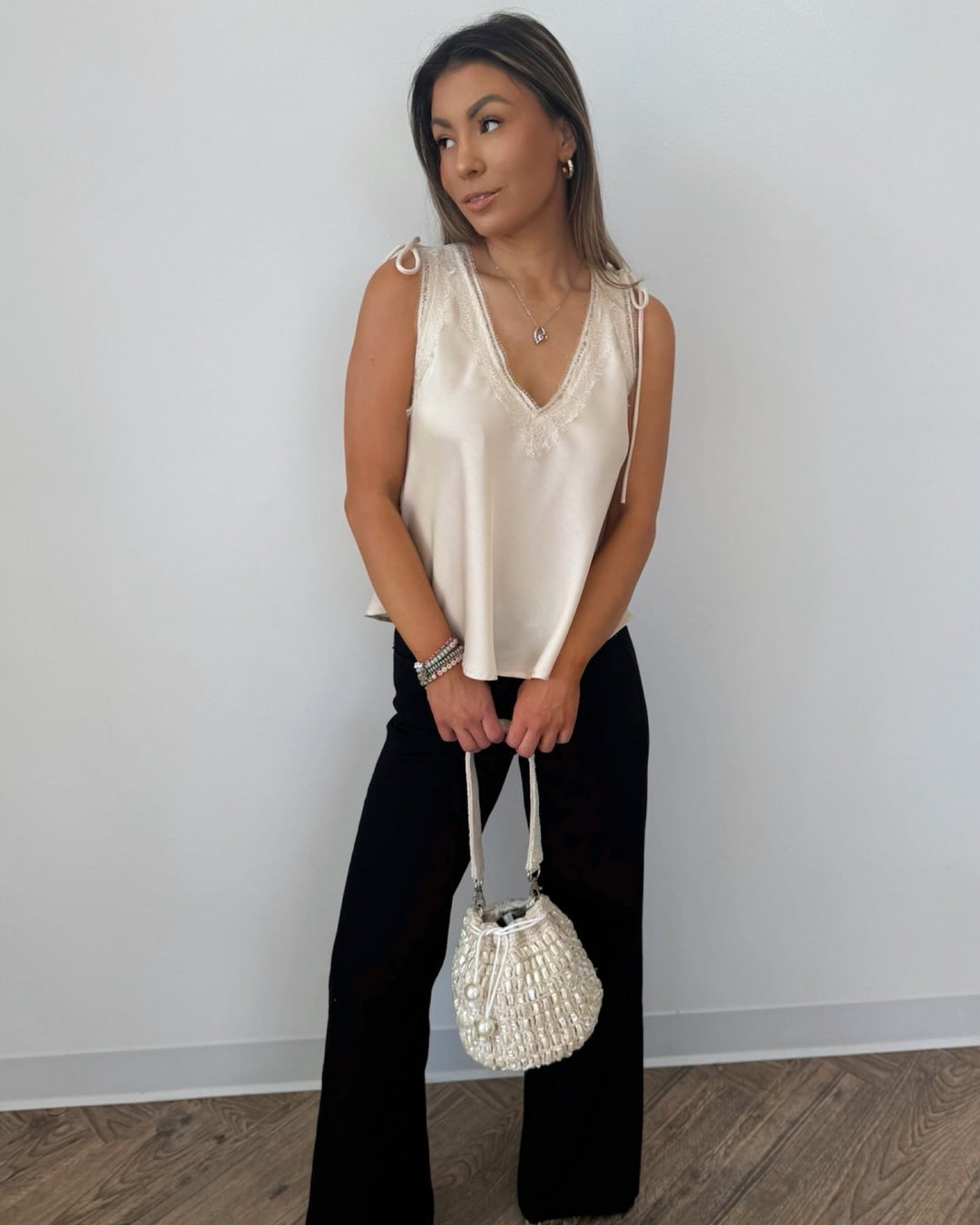 Rinna Sleeveless V Neck Top with Lace DetailSleeveless Top