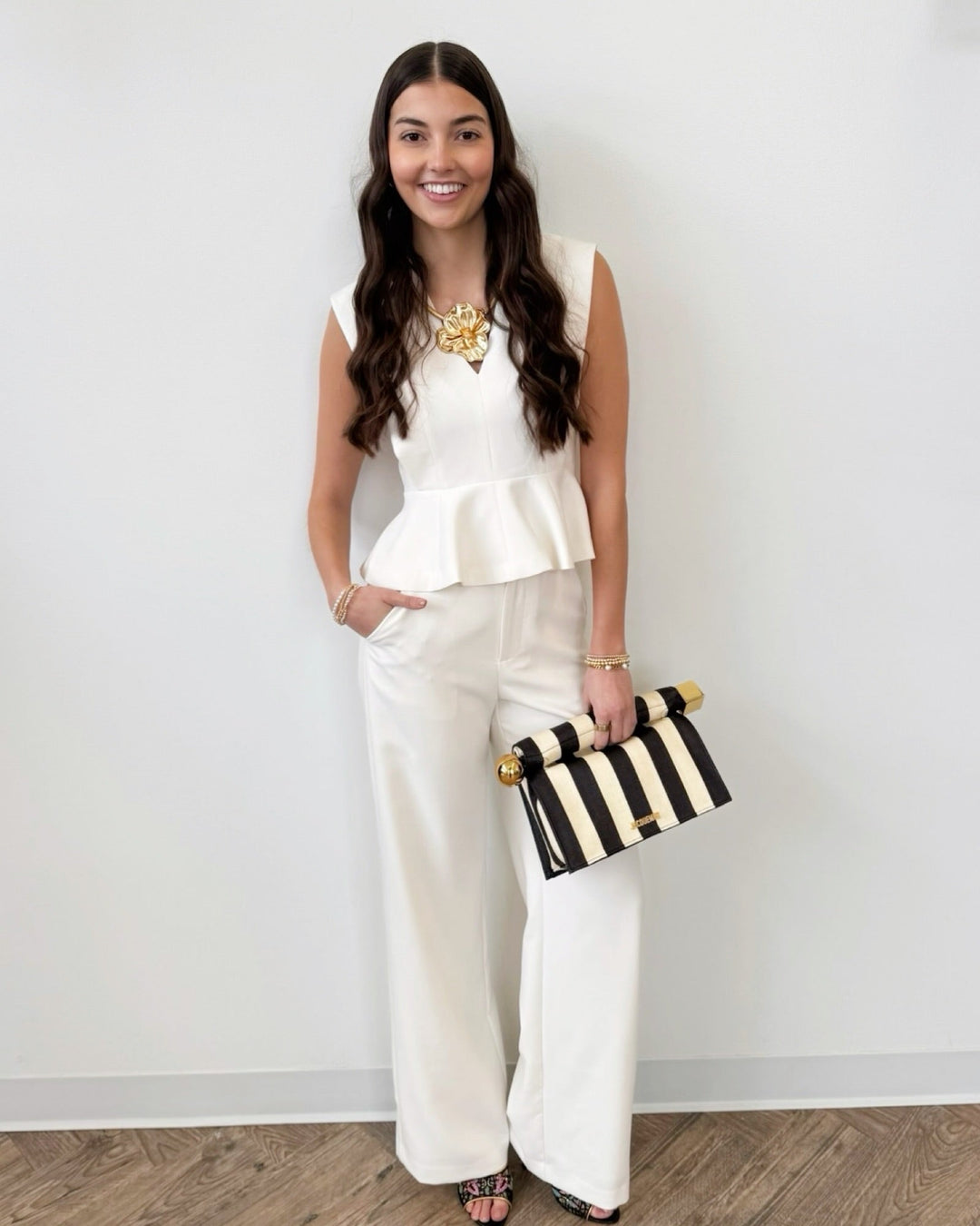 Roxanne Sleeveless Top with Peplum Hemsleeveless top