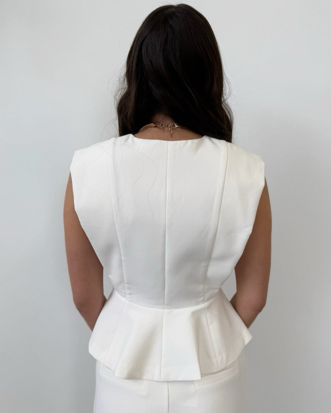 Roxanne Sleeveless Top with Peplum Hemsleeveless top