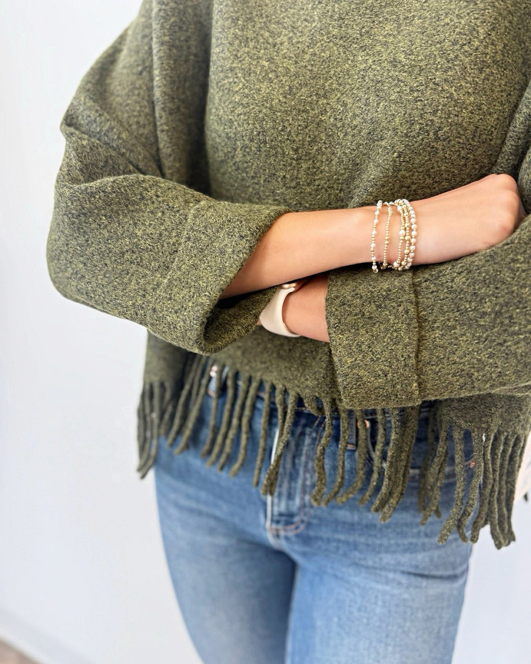 Sachi Long Sleeve Sweater with Fringe Hemlinelong sleeve knit