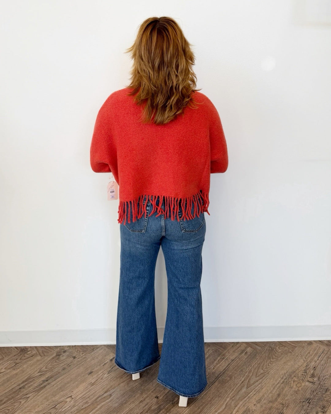 Sachi Long Sleeve Sweater with Fringe Hemlinelong sleeve knit